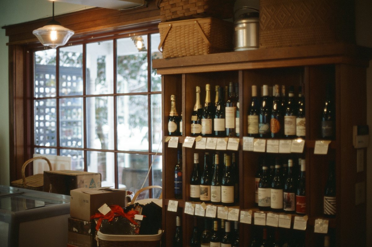 Wine bottles on shelves in a shop